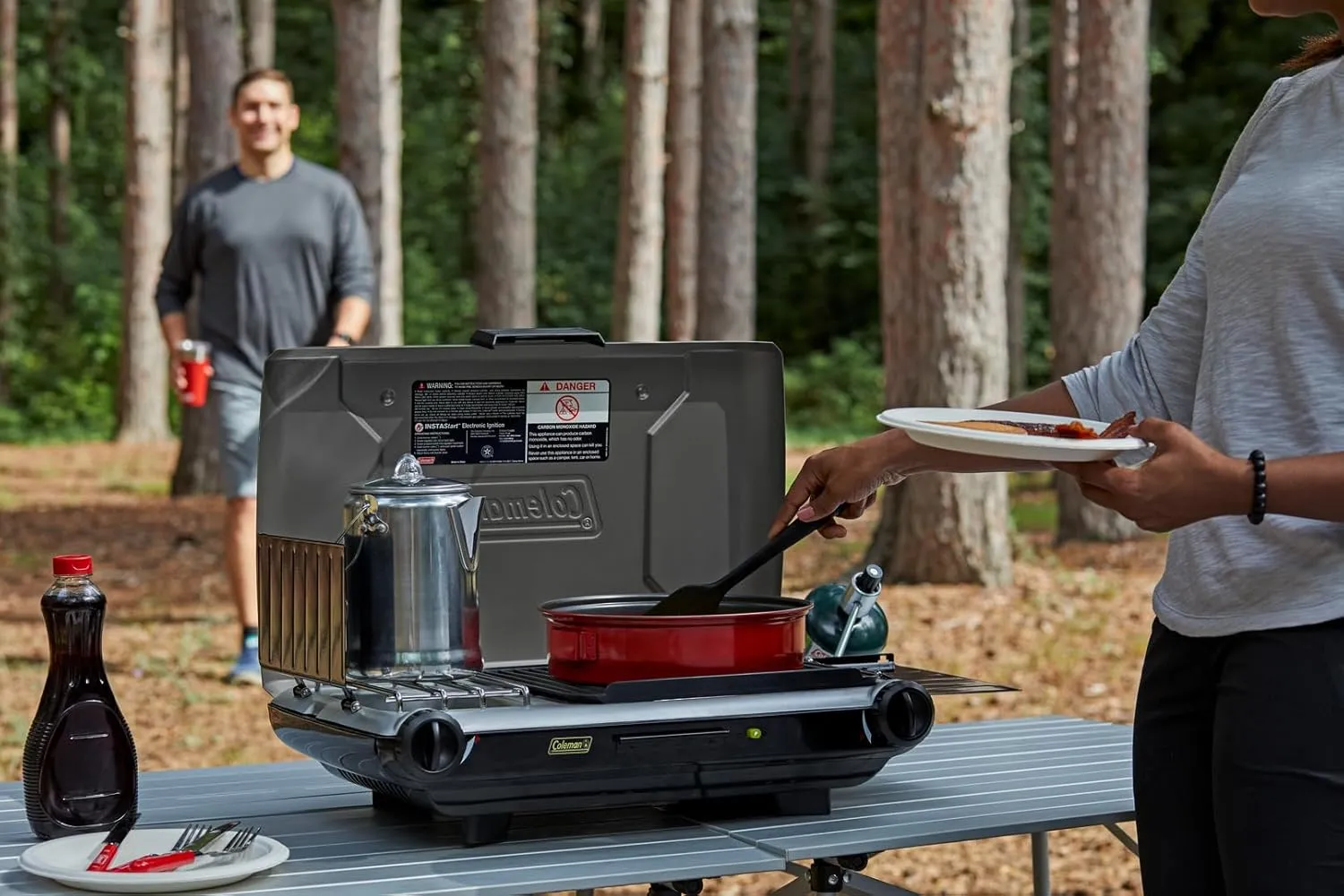 Coleman Tabletop 2-in-1 Grill & Stove with 2 Adjustable Burners, Propane Grill/Stove with Push-Button Starter, Wind Guards, Grease Tray, & 20,000 BTUs of Power for Camping, Tailgating, & More